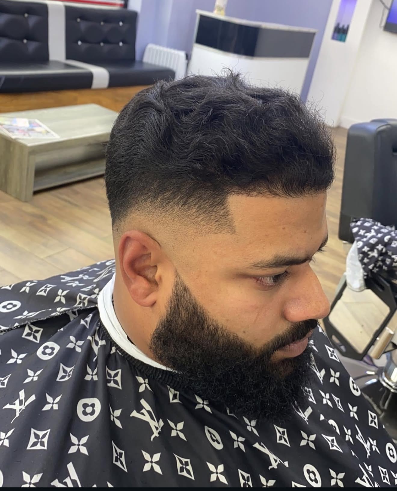 Beard sculpt with low fade