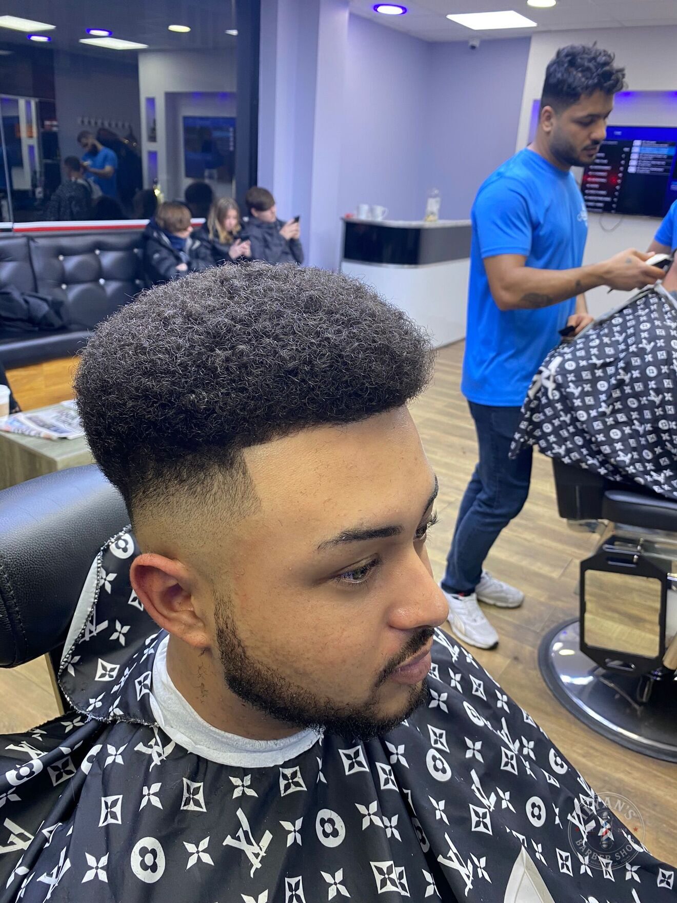 Afro High Top Fade with Beard at Ilyan's Barber Shop